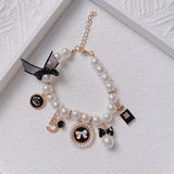 Black 4-PCS Pearl Charm Pet Necklace - Adjustable Bowknot Collar for Small Dogs & Cats (S: 20+5CM)