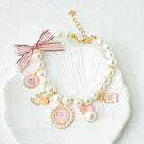 Pink 4-PCS Pearl Charm Pet Necklace - Adjustable Bowknot Collar for Small Dogs & Cats (M: 25+5CM)